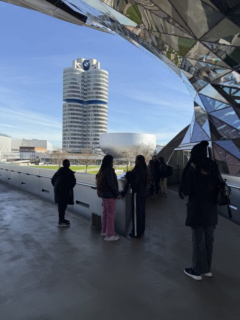 Students looking out at the BMW tower in Munich