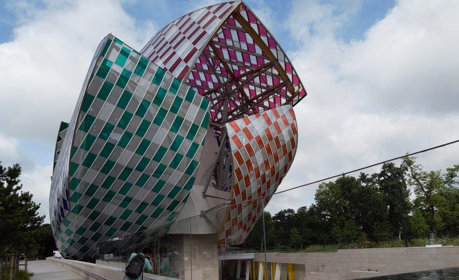 The Fondation Louis Vuitton in Paris, its glass sails covered in coloured panels